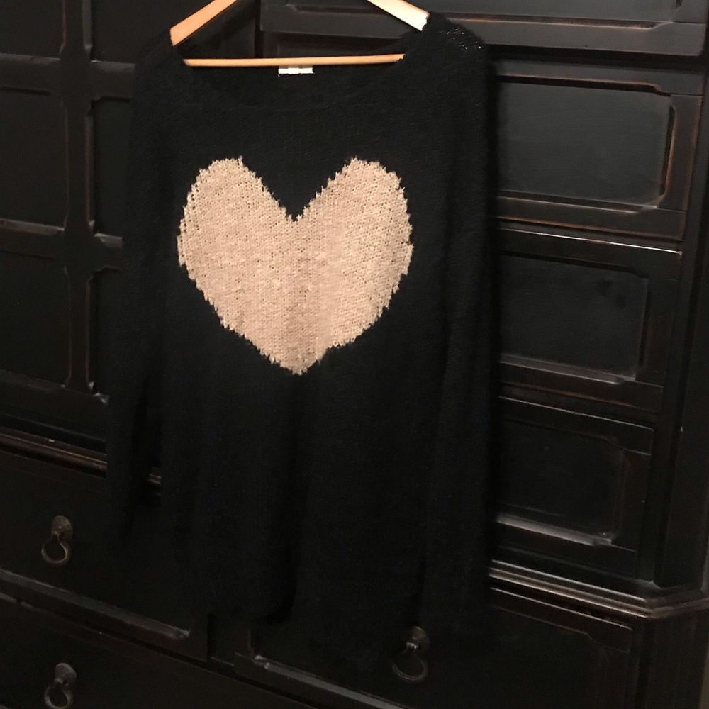 Black sweater with heart detail